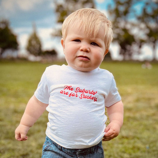 The Suburbs are For Suckers Baby Tee | thesuburbsareforsuckers.com